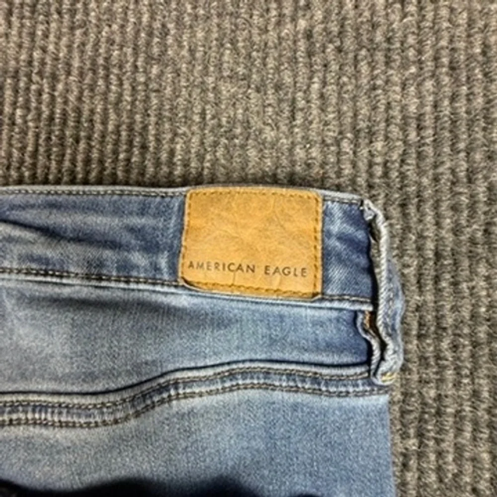 American Eagle Super Hi-Rise Jegging Womens 4 Blue Distressed Next Level Stretch